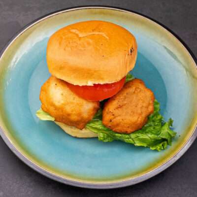 Akara served with bread styled as a burger in Nørrebro, Denmark